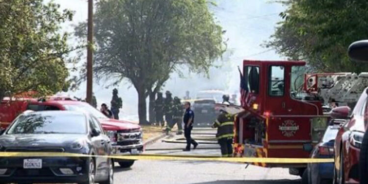 Policia ishte njoftuar për të shtëna me armë, zjarri shuan një familje në SHBA