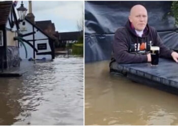 VIDEO/ Lokali i përmbytur nga shirat, pronari shijon birrën pa e prishur terezinë