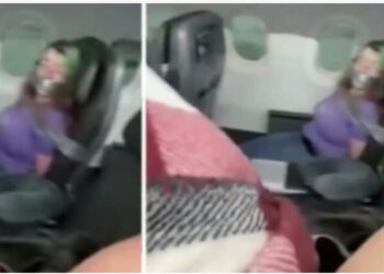 Pasagjerja tenton të hapë derën e aeroplanit, stafi detyrohet ta lidhë tek ulesja