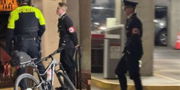 Video/ I dressed in a Nazi costume for Halloween, a young man hits a woman in the face with a glass after she tried to remove a tape from his arm.