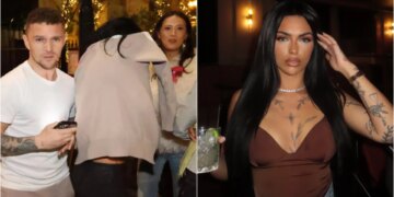 Ylli i Premier League, i zbuluar në shoqëri me modelen e një portali për të rritur, e mbulon veten me xhupin e hedhur krahëve për t'u mbajtur ngrohtë.