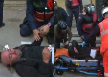 Video/ I gjakosur në rrugë, një person goditet nga protestuesit dhe policia e largon nga turma